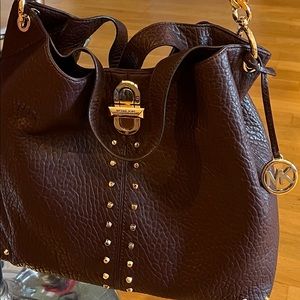 Wine Colored NWOT Michael Kors shoulder bag with gold accents